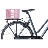 Pink Basil small bicycle crate with 17.5L capacity, eco-friendly bike basket, versatile mounting for accessories and storage.
