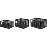 Black Basil Bicycle Crate MIK Small 17.5L recycled synthetic bike basket attached to a bike for carrying items.