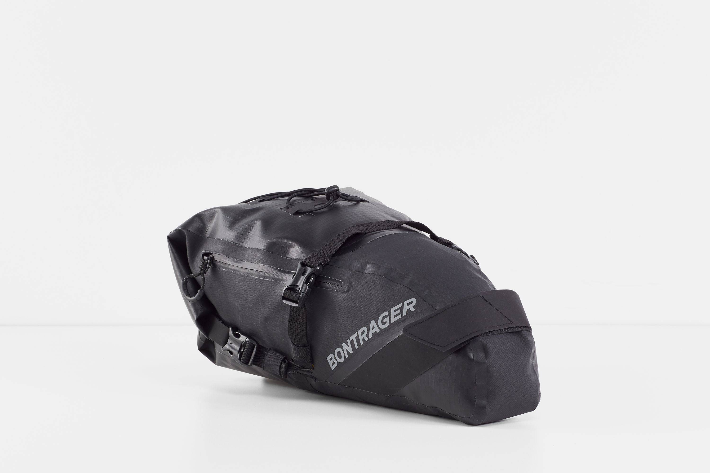 Bontrager Adventure 9L black water-resistant bike saddle bag with storage compartments for cycling accessories.