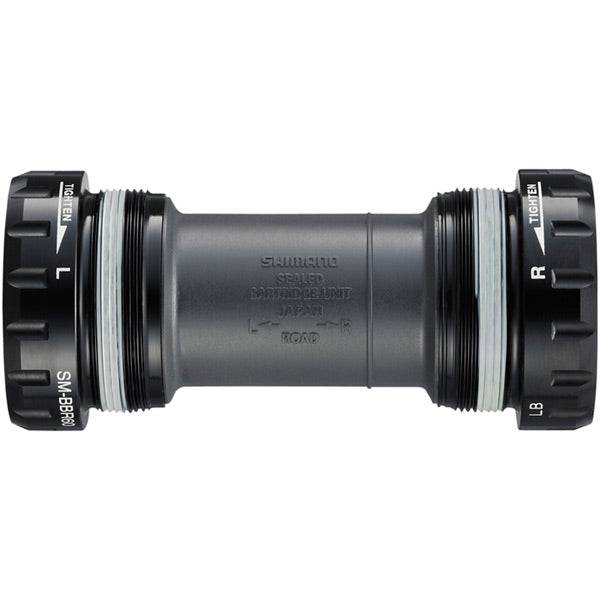 Shimano Ultegra BB-R60 bottom bracket for road bikes, featuring HollowTech II technology, shown installed in a bicycle crankset.