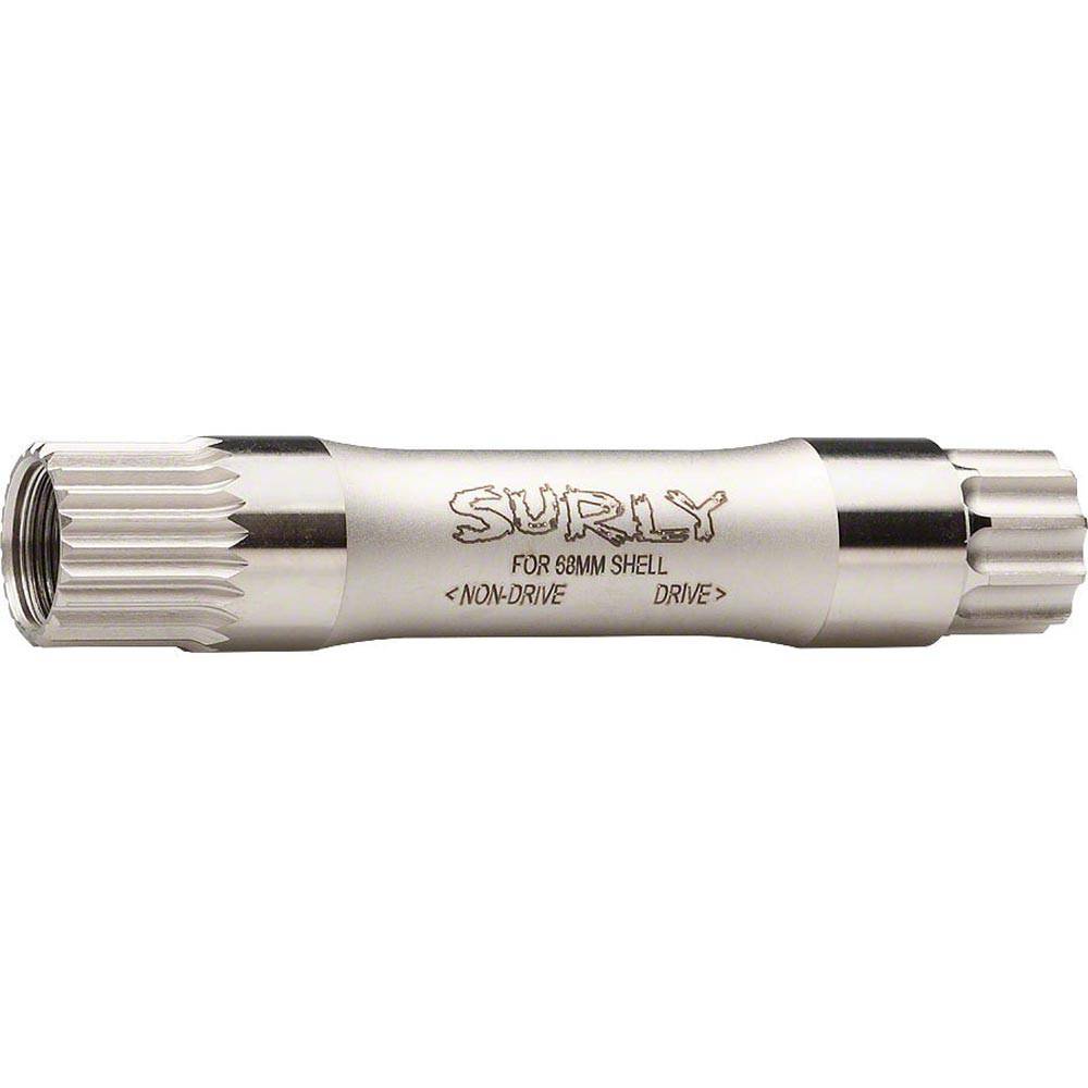 Surly Mr Whirly axle for cranksets, featuring multiple lengths for bottom bracket shells, shown in a close-up view of the bicycle component.
