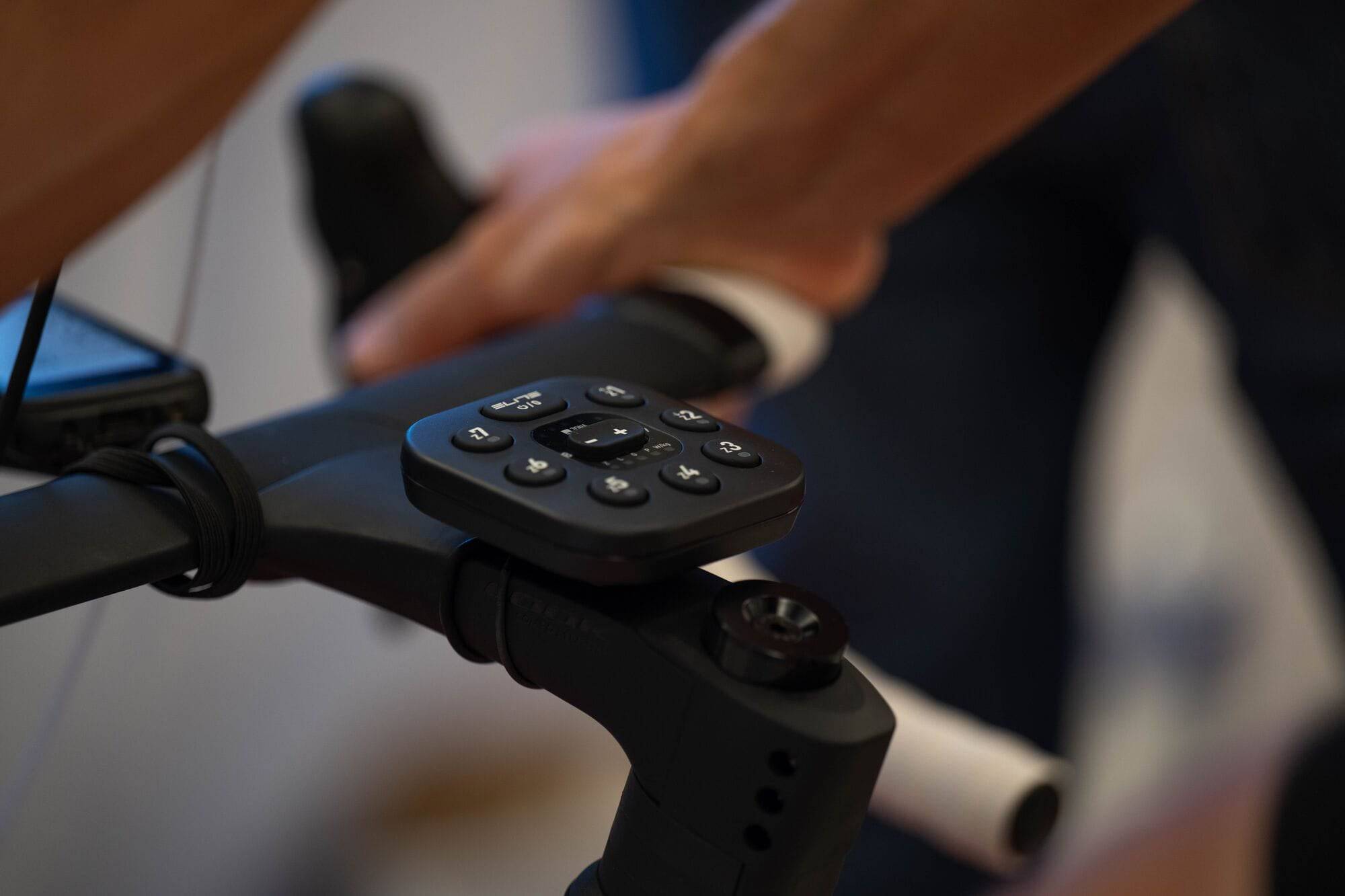 Elite Zona ANT+ trainer remote control accessory for indoor cycling smart trainers, shown with buttons and display.