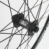 M Part Wheels gravel front wheel with 700c DT 370 hub, DT 540 rim, TLR tubeless-ready, black, lightweight component for cycling.