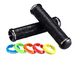 Giant Tactal Double Lock-On mountain bike grips with vibration reduction, shown on a bike handlebar, close-up view.