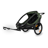 Hamax Outback Twin child bike trailer with suspension and safe connection point, designed for family bike rides.
