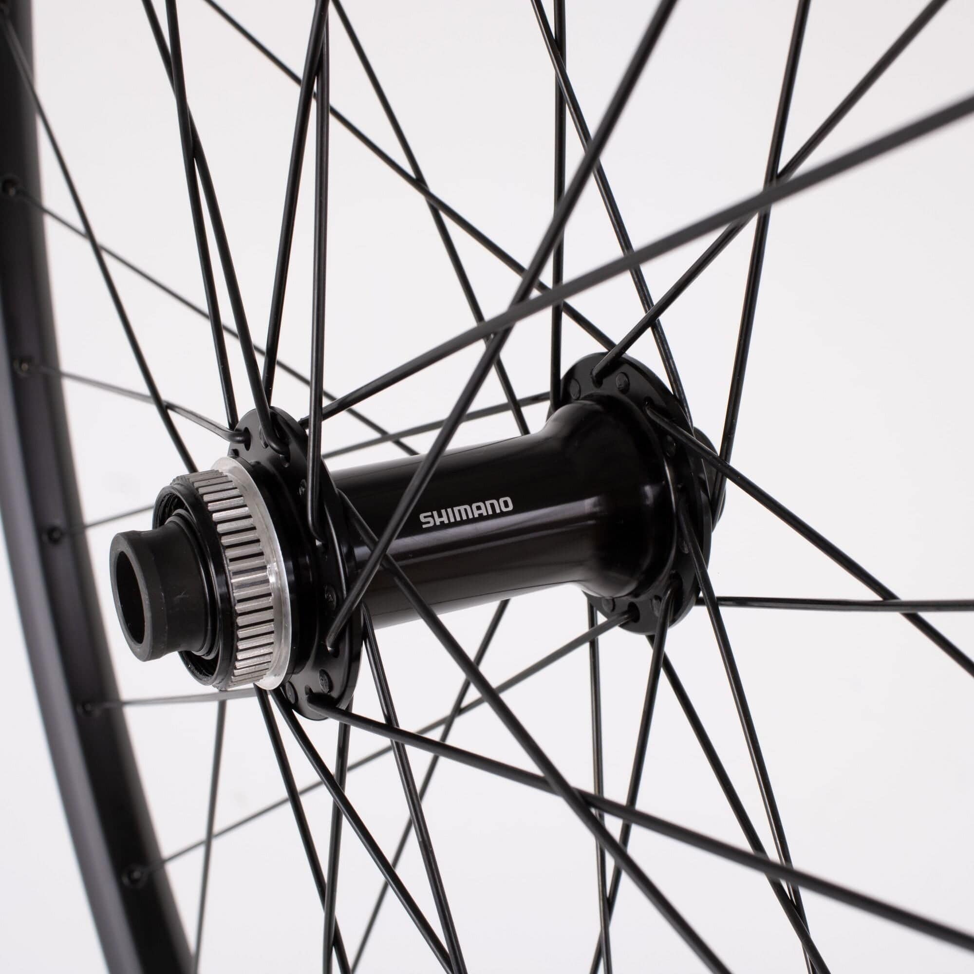 M Part Wheels M25 v2 29-inch boost front MTB wheel with tubeless-ready hub and 110x15mm thru-axle for mountain biking.