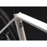 Basso Palta gravel bike frameset with Paradigma stem and carbon handlebars, showcasing sleek frame design and components.