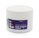Morgan Blue chamois cream solid tub for cyclists, providing anti-chafing skin protection, shown in a close-up image.