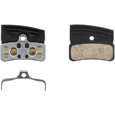 Shimano XTR P04C-MF metal sinter disc brake pads with cooling fins and spring for mountain bike braking components.