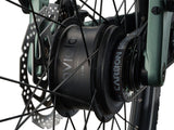 Giant Explore E+ 2 Stagger MY26 electric hybrid bike with SyncDrive Sport2 motor and safety features, shown outdoors.