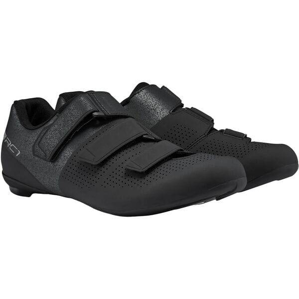 Shimano RC1W women's road cycling shoes with reflective safety features, shown with black and white design and secure straps.