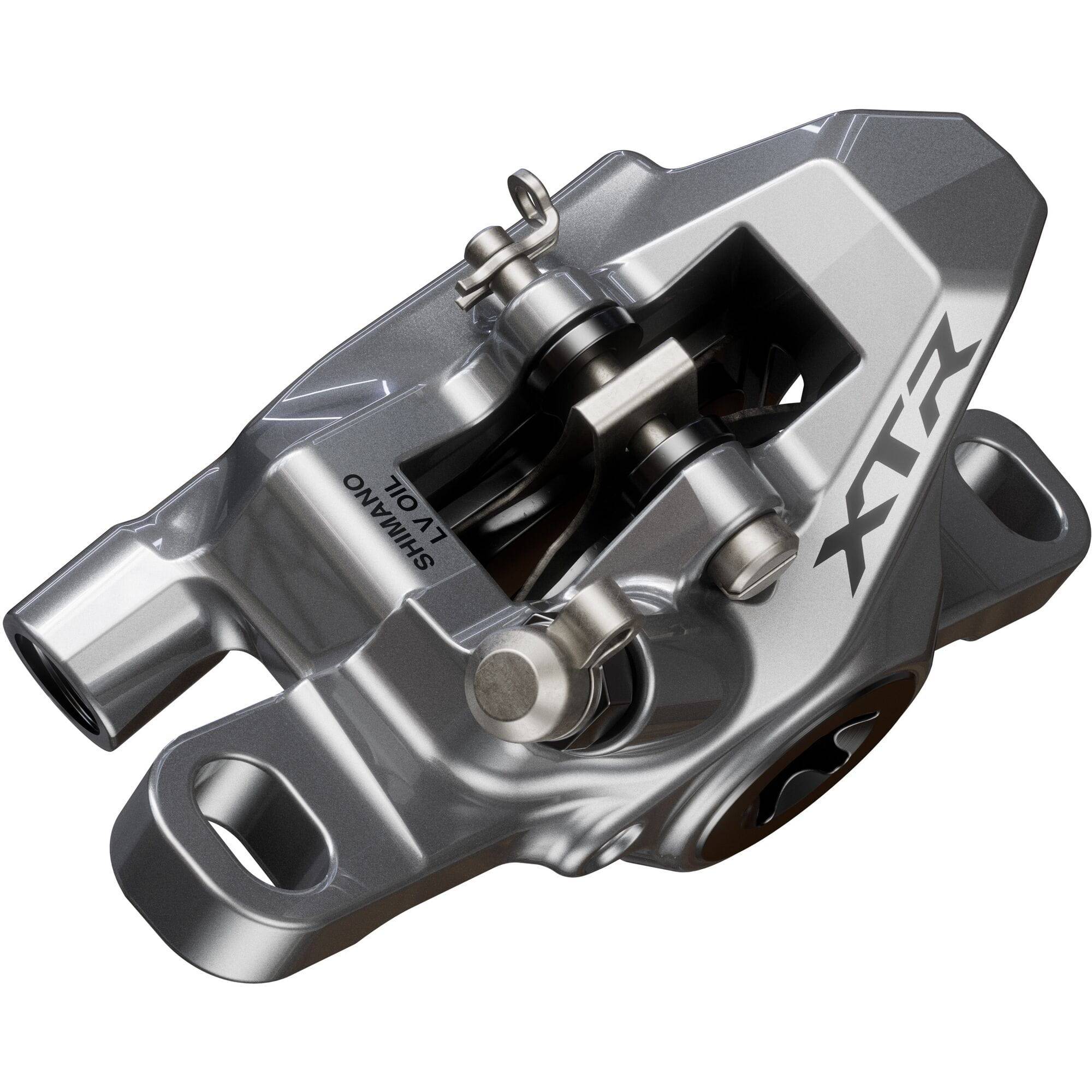 Shimano XTR BR-M9200 2-pot post mount disc brake caliper for front or rear MTB bicycle, detailed view of the brake component.