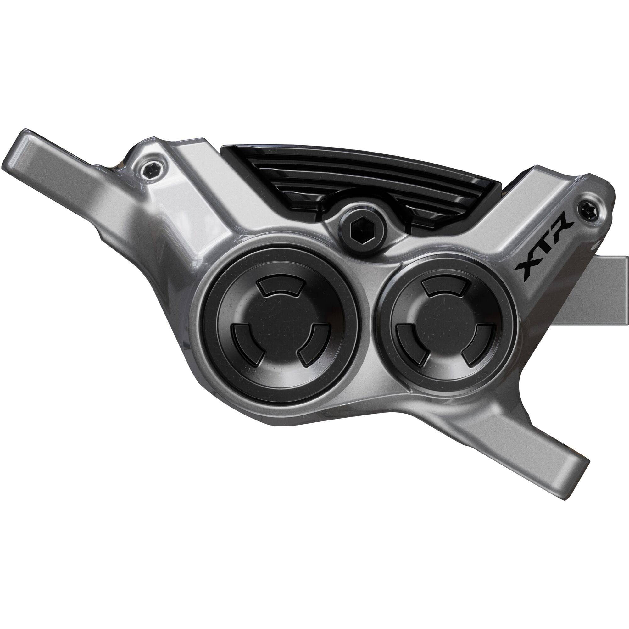 Shimano XTR BR-M9220 4-pot hydraulic disc brake caliper for front or rear post mount bicycle braking system.