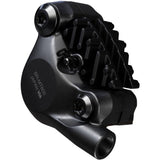 Shimano Deore XT BR-MT805 rear 2-pot flat mount disc brake caliper for bikes, shown in black with mounting hardware.