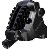 Shimano Deore XT BR-MT805 rear 2-pot flat mount disc brake caliper for bike components, shown in black with mounting hardware.