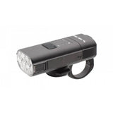 Moon Sport Rigel Enduro 2600lm front bike light in black with USB-C charging port, mounted on a bicycle for visibility.