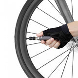 Topeak AirBooster Nano CO2 inflator for Presta and Schrader valves, compact black bike pump accessory.