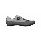 Fizik R4 Tempo Overcurve road cycling shoes with BOA closure and carbon outsole, shown from the side highlighting design and closure system.