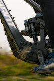 Giant Reign Advanced E+ 1 2026 electric mountain bike with SyncDrive Pro motor and Maestro suspension, black frame, outdoor setting