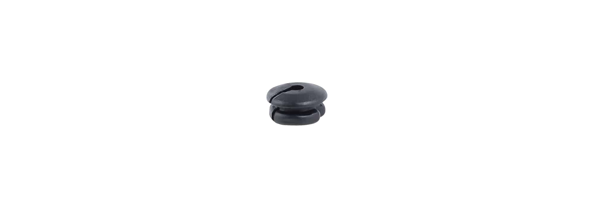 Black Trek seat tube wire routing grommet for Di2 and EPS electronic shifting components on bicycle frame.