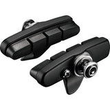 Shimano 105 R55C4 cartridge brake shoes for direct mount alloy rims, pair, bicycle components for effective braking.