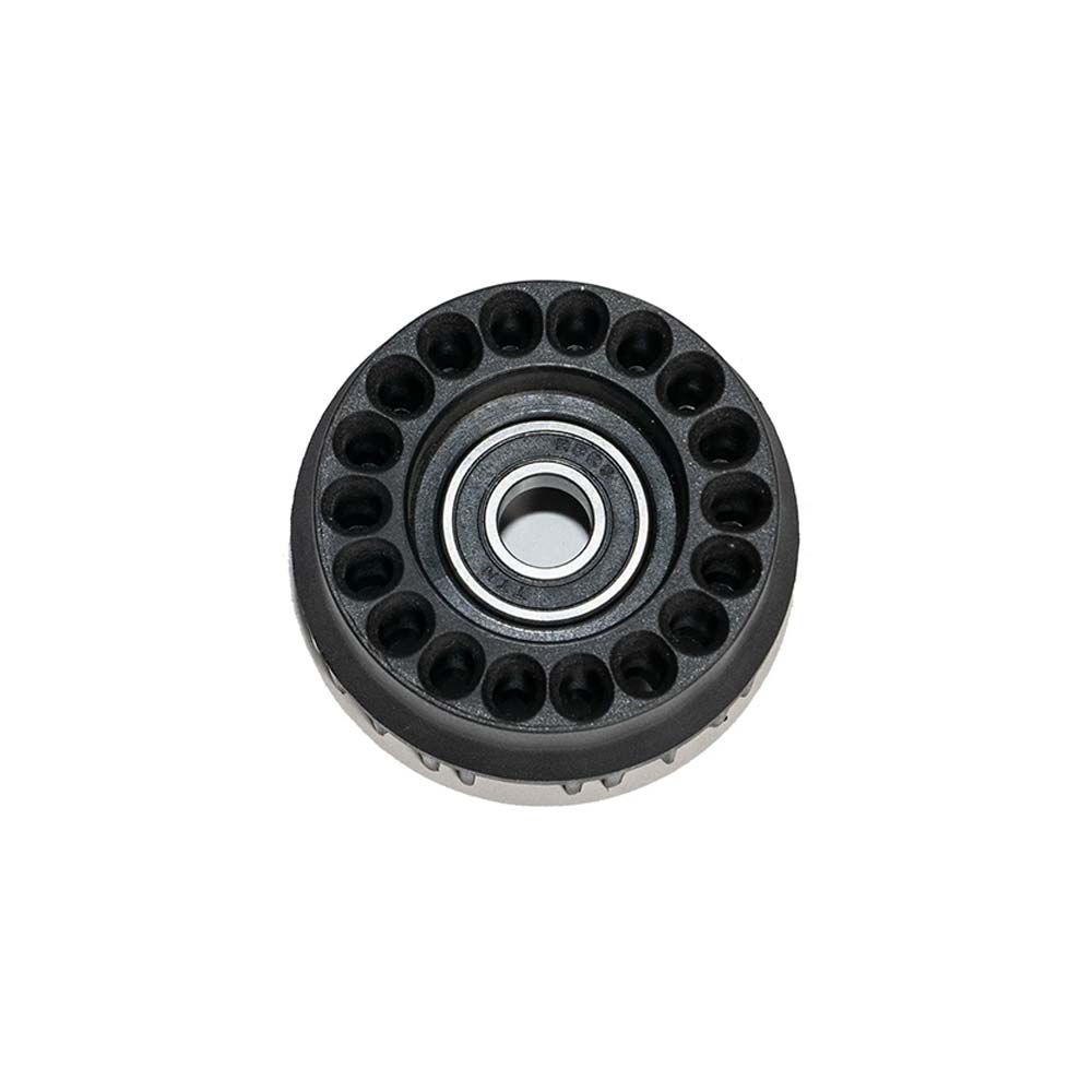 Burley replacement wheel sprocket with bearings for bike trailers, showing the durable gear and bearing components.