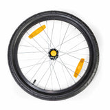 Burley 20-inch push button wheel assembly with axle, tire, and inner tube for bike accessories, showing assembled wheel components.