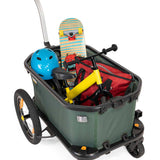 Burley Hopper bike trailer and wagon in black, showing its compact outdoor cargo carrier design with hitch and wheels.