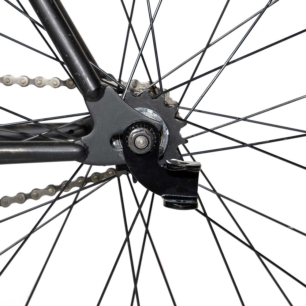 Burley Steel Hitch for bike trailers, durable and easy to install, shown attached to a bicycle, compatible with various trailer models.
