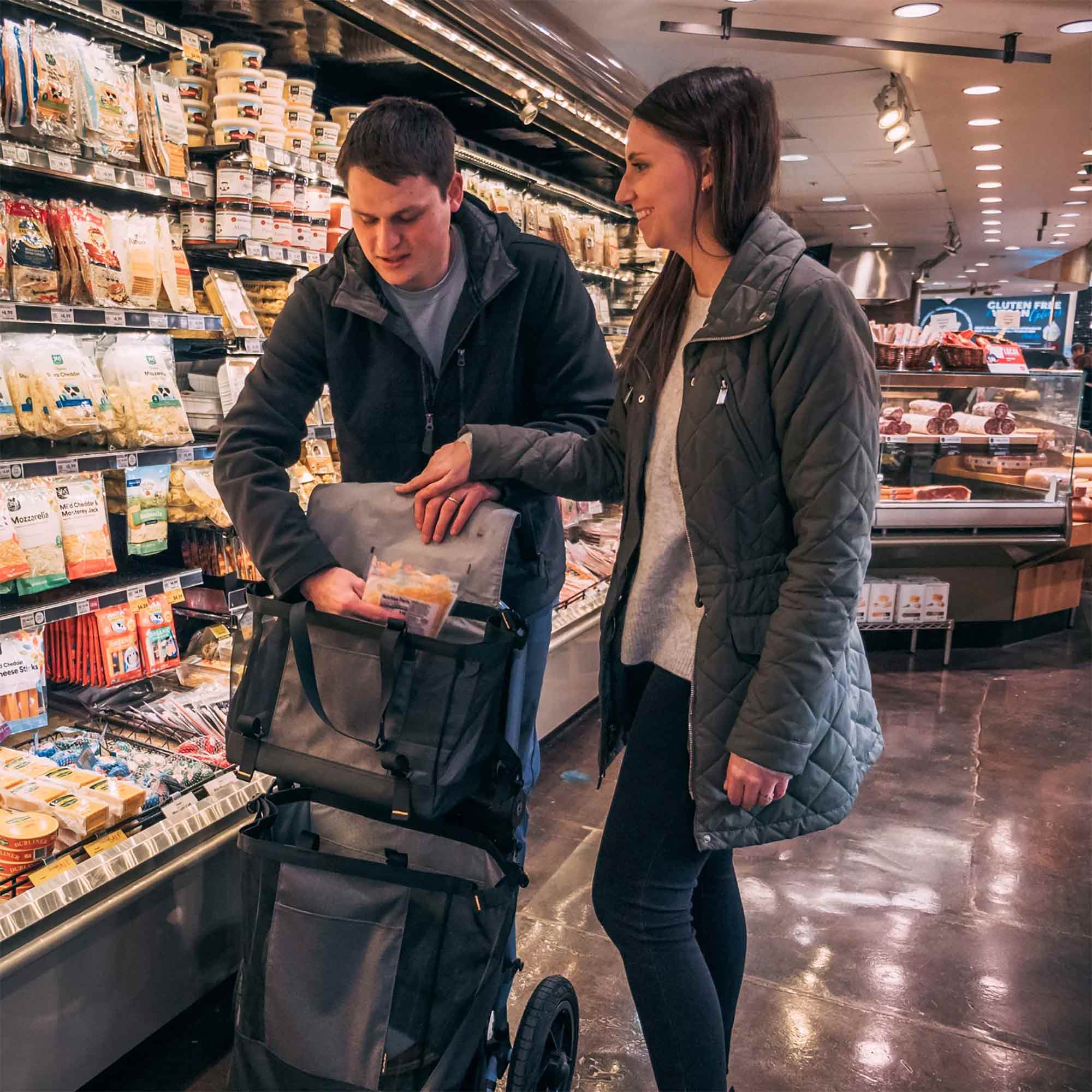 Burley Lower Market Bag 40L tote with removable base and trailer clips, shown as a durable accessory for bike cargo.