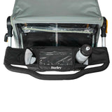 Burley handlebar console with cup holders and clear phone pocket for trailers, mounted on bike handlebars.