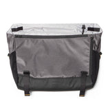 Burley Transit Messenger Bag with laptop sleeve and Travoy trailer clips, versatile accessories for commuting and outdoor activities.
