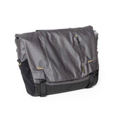 Burley Transit messenger bag with laptop sleeve and Travoy trailer clips, durable accessories for urban commuting.