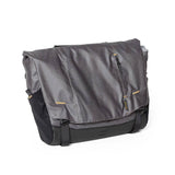 Burley Transit messenger bag with laptop sleeve and Travoy trailer clips, durable accessories for urban commuting.