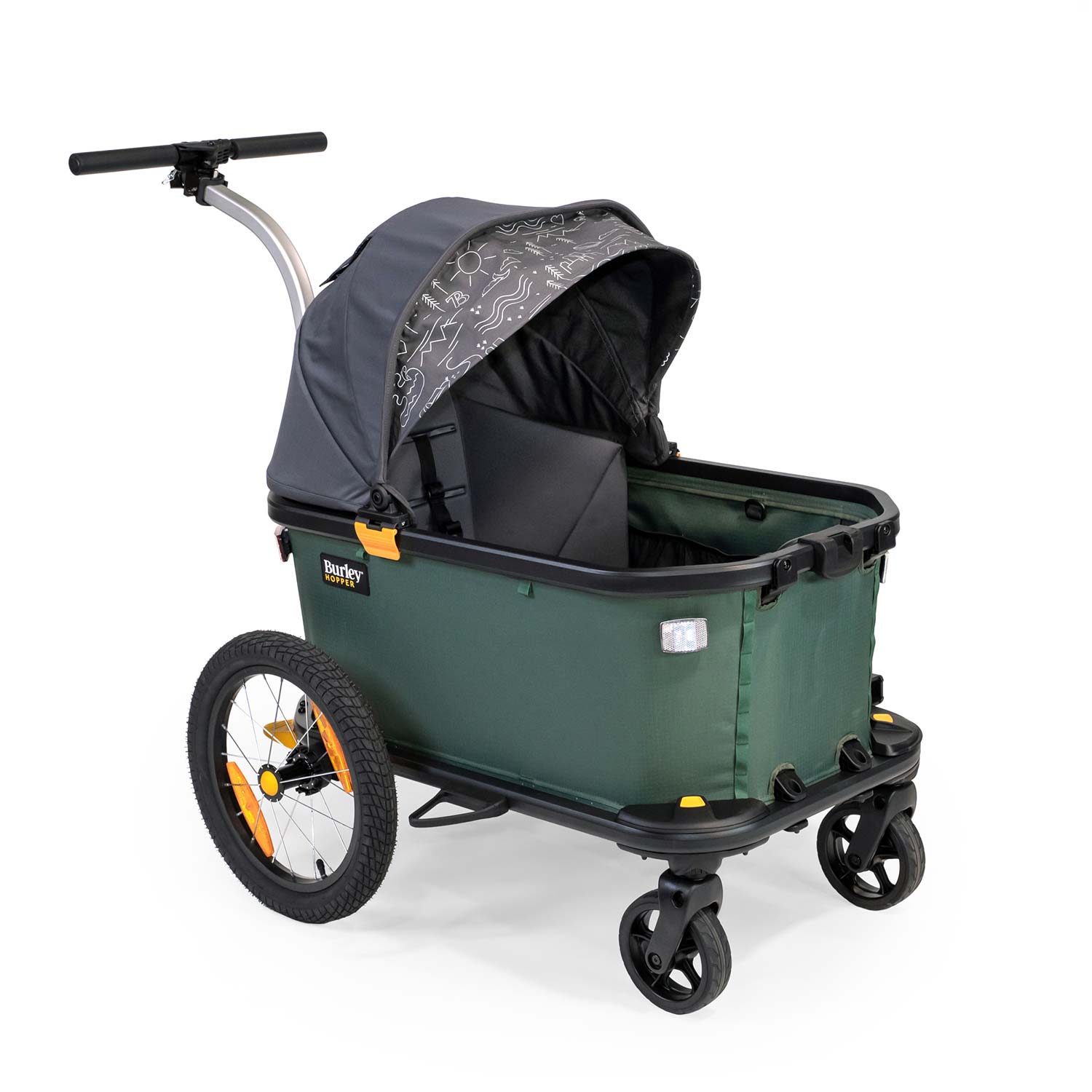 Burley Hopper seat insert and sunshade kit for stroller wagon conversion, showing comfortable padded seating and sunshade extension.