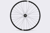 Crank Brothers Synthesis Alloy XCT rear mountain bike wheel with CB hub, featuring durable alloy rim and quick-release skewer.