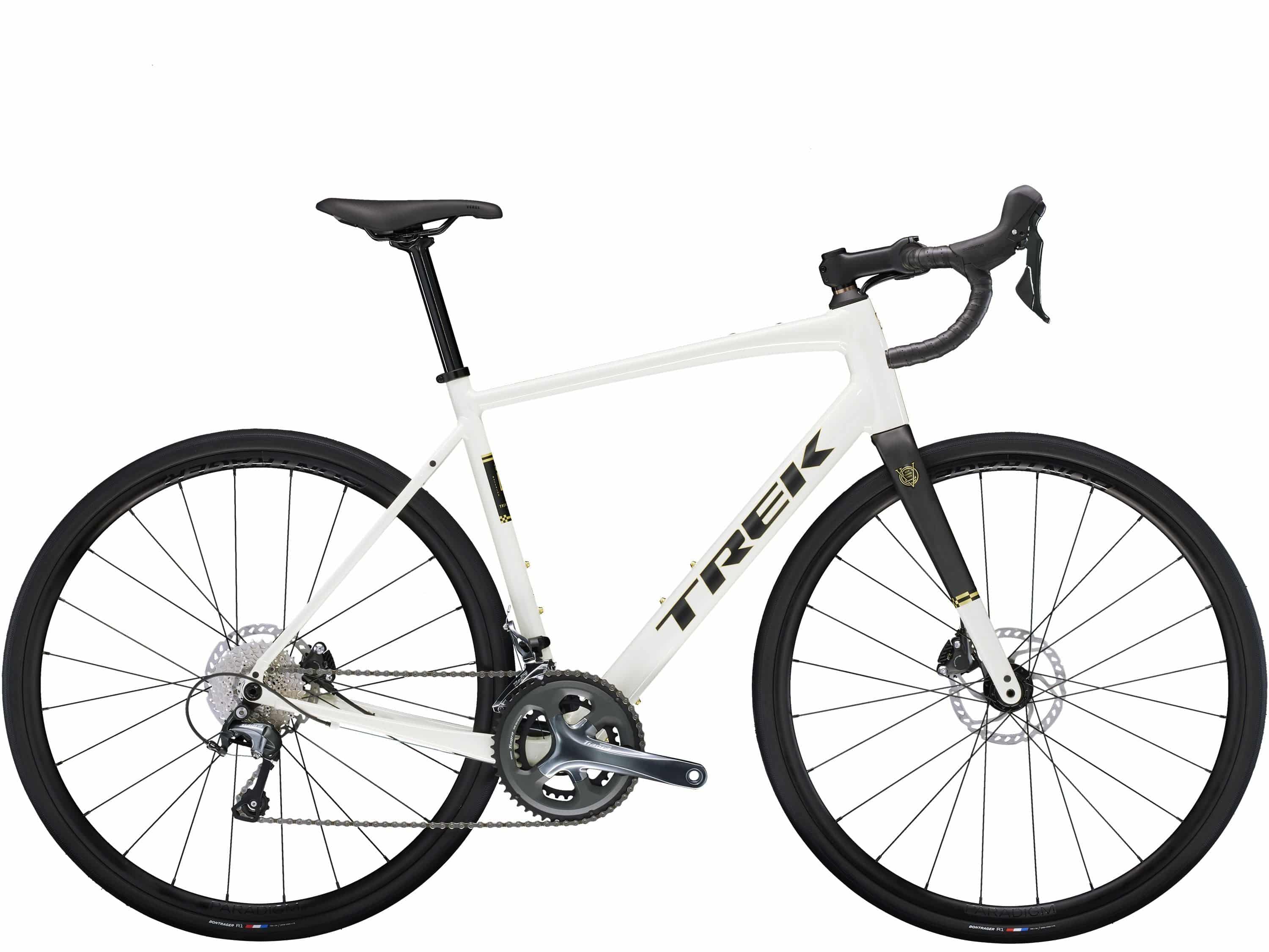Trek Domane AL 4 Gen 4 road bike with Shimano Tiagra 10-speed drivetrain and disc brakes, shown from side view.