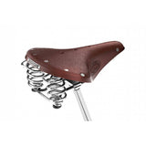Brooks B67 Ladies Saddle with coil spring suspension for comfortable bike riding, shown on a bicycle seat.
