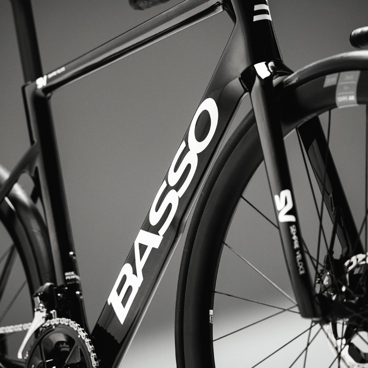 Basso SV Super Record 13x wireless road bike with Campagnolo disc brakes, sleek frame, and high-performance cycling components.