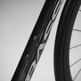 Basso SV Super Record 13x wireless road bike with Campagnolo disc brakes, sleek frame and modern design, close-up view.