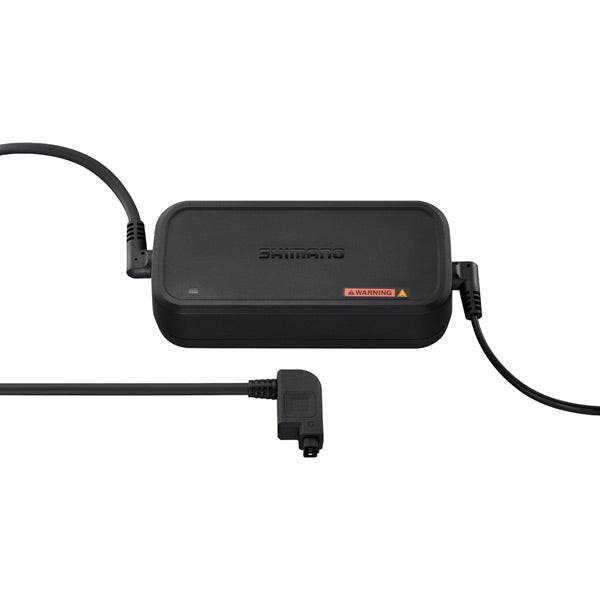 Shimano STEPS EC-E8004 e-bike battery charger with built-in UK plug and power cable, designed for Shimano e-bike batteries.