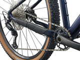 Giant Talon 29 0 mountain bike with Shimano Deore M6100 drivetrain and disc brakes, shown on rugged trail terrain