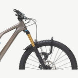 Aeroe Spider front rack for MTB and eMTB bikes with quick-release system, mounted on a mountain bike for carrying gear.