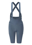 Rab Cinder Cargo Women's Cycling Bib Shorts with chamois padding and mesh pockets, designed for comfort and performance.