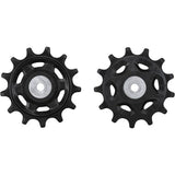 Shimano CUES RD-U8000 MTB rear derailleur tension and guide pulley set, replacement components for mountain bike drivetrain.