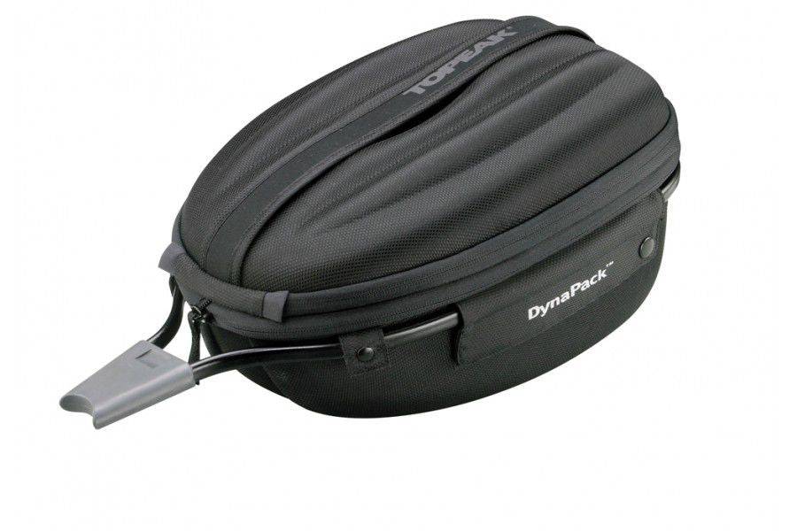 Topeak Dynapack DX black expandable bike seatpost bag with helmet storage and reflective safety features, mounted on bike seatpost