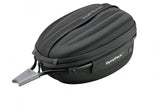 Topeak Dynapack DX black expandable bike seatpost bag with helmet storage and reflective safety features, mounted on bike seatpost