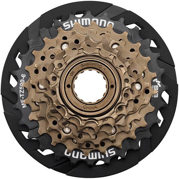 Shimano Tourney TY MF-TZ500 6-speed freewheel with 14-28T gears for mountain bike components, shown on the bike's rear wheel.