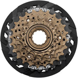 Shimano Tourney TY MF-TZ500 6-speed freewheel with 14-28T gears for mountain bike components, shown on the bike's rear wheel.