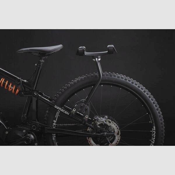 Aeroe Spider rear bike rack with cradle mount system for bikes and e-bikes, shown mounted on a bicycle frame.